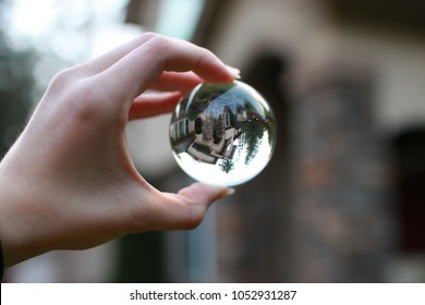 Holding Glass Ball. 