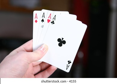holding a hand of cards