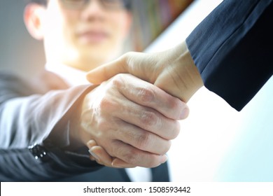 Holding hands with business partners to trust business partners, relationships to achieve future commercial and investment goals. - Shutterstock ID 1508593442