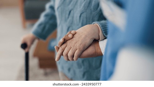 Holding hands, help with elderly person and caregiver in nursing home, kindness and senior care for health. Retirement, pension and patient with disability, nurse for assistance and homecare closeup - Powered by Shutterstock