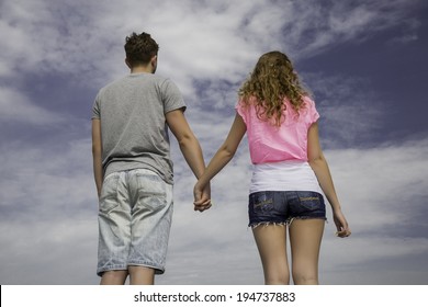 Teens Holding Hands