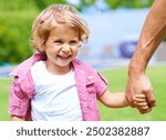 Holding hands, single parent or child in garden for safety, love or bonding together for walking and care. Father, happy boy or guardian in nature for support or playing with smile, growth or kid