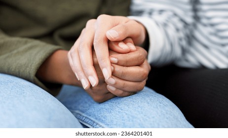 Holding hands, support and closeup of a couple in therapy for love, respect or trust in marriage. Together, hope and people with care, help and in counseling for relationship with compassion - Powered by Shutterstock