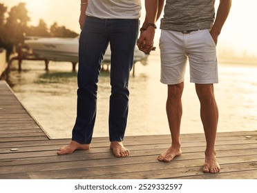 Holding hands, travel and gay couple by pool on vacation, getaway or weekend trip for romance. Love, boardwalk and legs of queer men in relationship with connection, bonding or care at holiday resort - Powered by Shutterstock