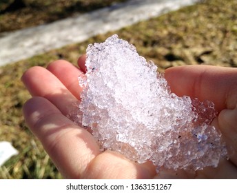 Holding ice in small girls hand - Powered by Shutterstock