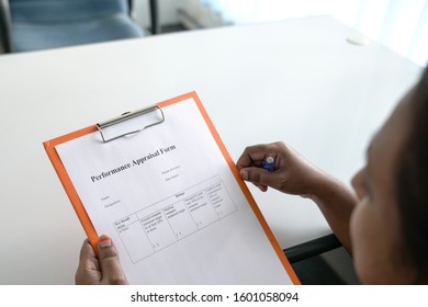 Holding Performance Appraisal Form On Clipboard Foto Stok 1601058094 ...