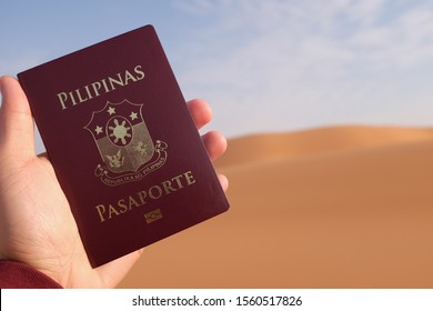 Holding a Philippine passport while in the desert of Saudi Arabia. Filipinos abroad.