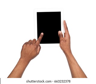 Holding and pointing to blank screen on digital tablet. African american man using device with blank screen, copy space for advertisement, isolated on white background