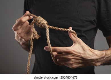 Holding A Rope For The Gallows