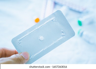 Holding Single Tablet Emergency Control Pill Oral Contraception.family Planning Concept.