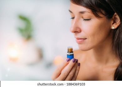 Holding And Smelling Ayurvedic Oil 