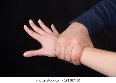 Holding Tight. Man Holding Female Hand. Isolated