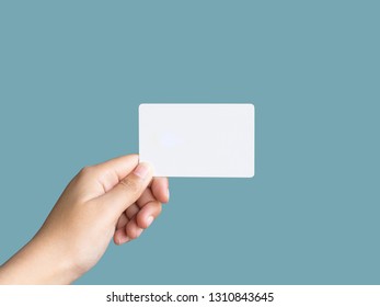 Holding Up  White Business Card Mockup On Pastel Color Background. 