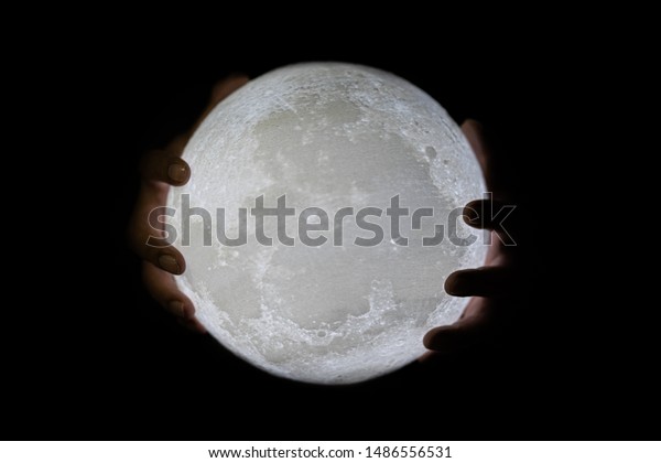Holding White Full Moon In
Hands