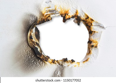 hole burned in white plastic