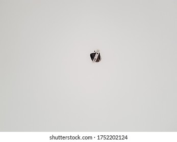 Hole in the ceiling,white background.