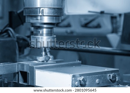 The hole chamfering and deburring process on engineering-grade metal parts using a milling machine and specialized tools such as chamfer tools or countersinks.