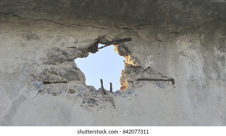 Hole In Concrete Wall