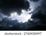 Hole in the Dark and Dramatic Storm Clouds