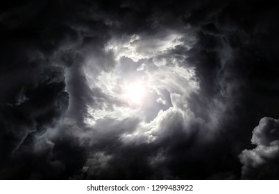 Hole in the Dark and Dramatic Storm Clouds - Shutterstock ID 1299483922