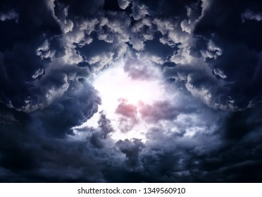 Hole in the Dark and Dramatic Storm Clouds