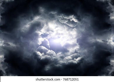 Hole in the Dark and Dramatic Storm Clouds - Shutterstock ID 768712051
