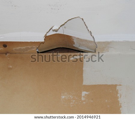 A Hole in a Drywall Ceiling