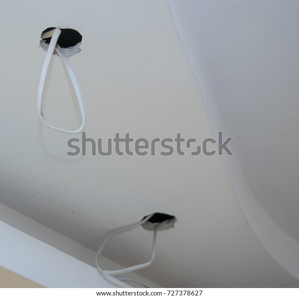 Hole False Ceiling Protruding Electric Wire Stock Photo