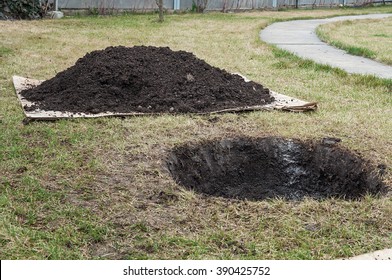 Hole In Ground, Digging A Hole On Lawn For Plant, Pile Of Soil