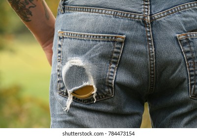 hole in jeans after snuff jar