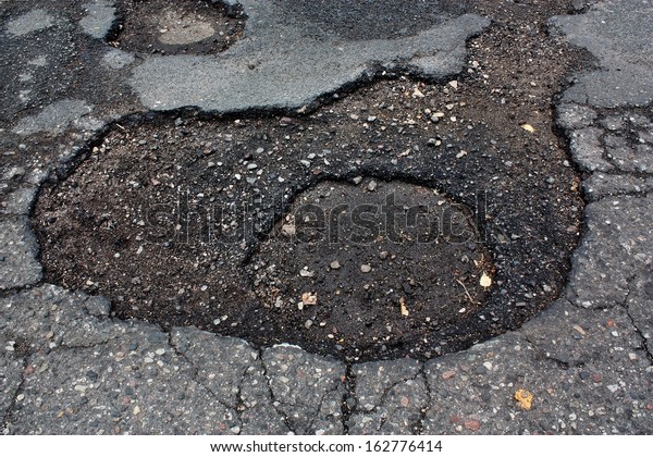 Hole on damage road way\
asphalt