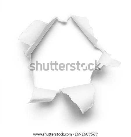 Hole in paper, isolated on white background