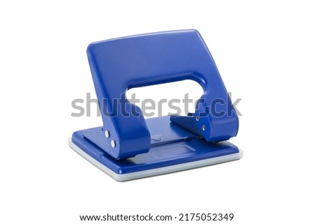 Hole puncher blue color isolated on white background.[Clipping path].