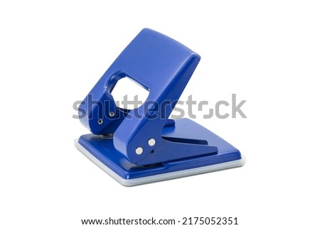 Hole puncher blue color isolated on white background.[Clipping path].