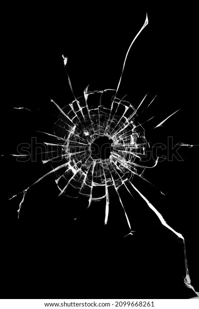 Hole in the window. Cracked broken black glass.\
Texture concept for design
