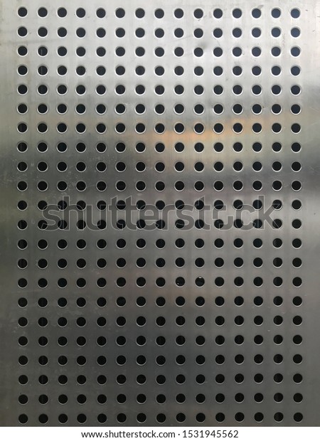 Holes in the stainless steel\
sheet