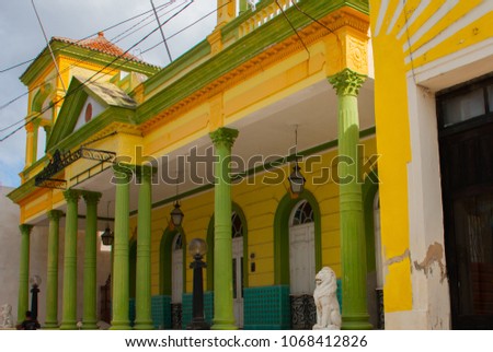 Holguin, Cuba: Classic yellow building with green columns in the city center. Stock photo © 