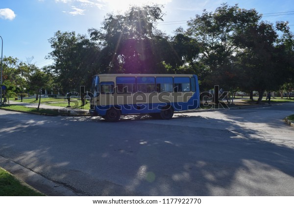 HOLGUIN, CUBA - SEPTEMBER 10 2018: Old Cuban bus on\
the road