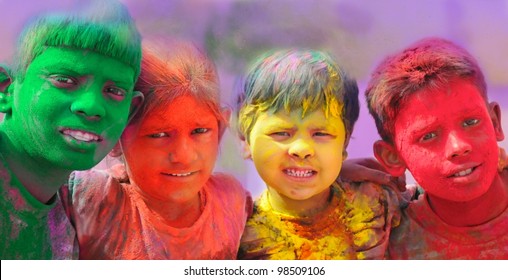 Holi Celebrations - Group Of Kids Playing Holi In India.