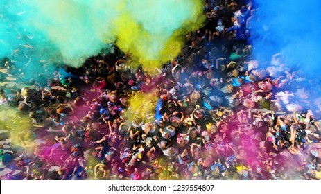 Holi Colours Festival. Crowd Of Happy People With Paints. Aerial. 