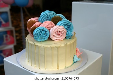 A Holiday Cake In Blue Pink Colors For A Gender Revelation Party