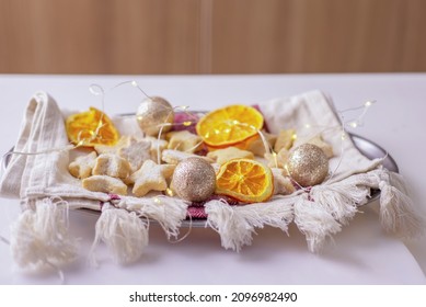 Holiday Cookies, New Year's Christmas Sweets, Cookies, With Dried Oranges And Lights, Festive Decorating Table