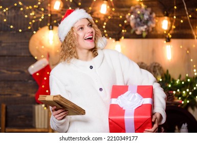 Holiday Delivery. Woman Hold Gift. Post Office. Shipping Parcels. Courier Delivery Service. Christmas Bucket List. Girl Santa Hat Hold Gift Box. Delivery Services. Send Parcel To Relatives Friends