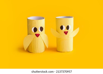 Holiday easy DIY craft idea for kids. Toilet paper roll tube toy chick baby on yellow background. Creative Easter decoration eco-friendly, reuse, recycle, zero waste handmade minimal concept. banner - Shutterstock ID 2137370957