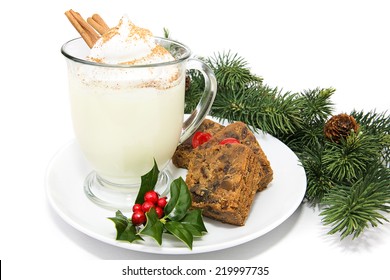 Holiday Eggnog With Fruitcake, Isolated On White With Holly And Pine Garnish.  