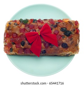 Holiday Fruit Cake Gift With A Bow Isolated On White With A Clipping Path.