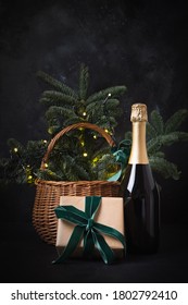 Holiday Gift Hamper With Craft Gift And Sparkline Wine On Black. Christmas Present. Happy New Year.