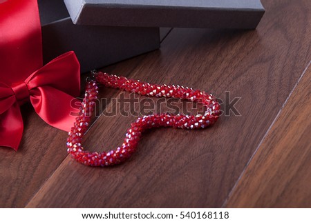 Holiday Gift Packed  on Glossy Wooden Table