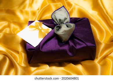 Holiday Gift Wrapped In High-quality Fabric