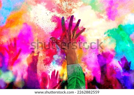 Holiday Holi concept.An explosion of multi-colored paint, bright vibrant pigments. Noisy dust and powder texture, flicker and shimmer noise. Background with hands for design.